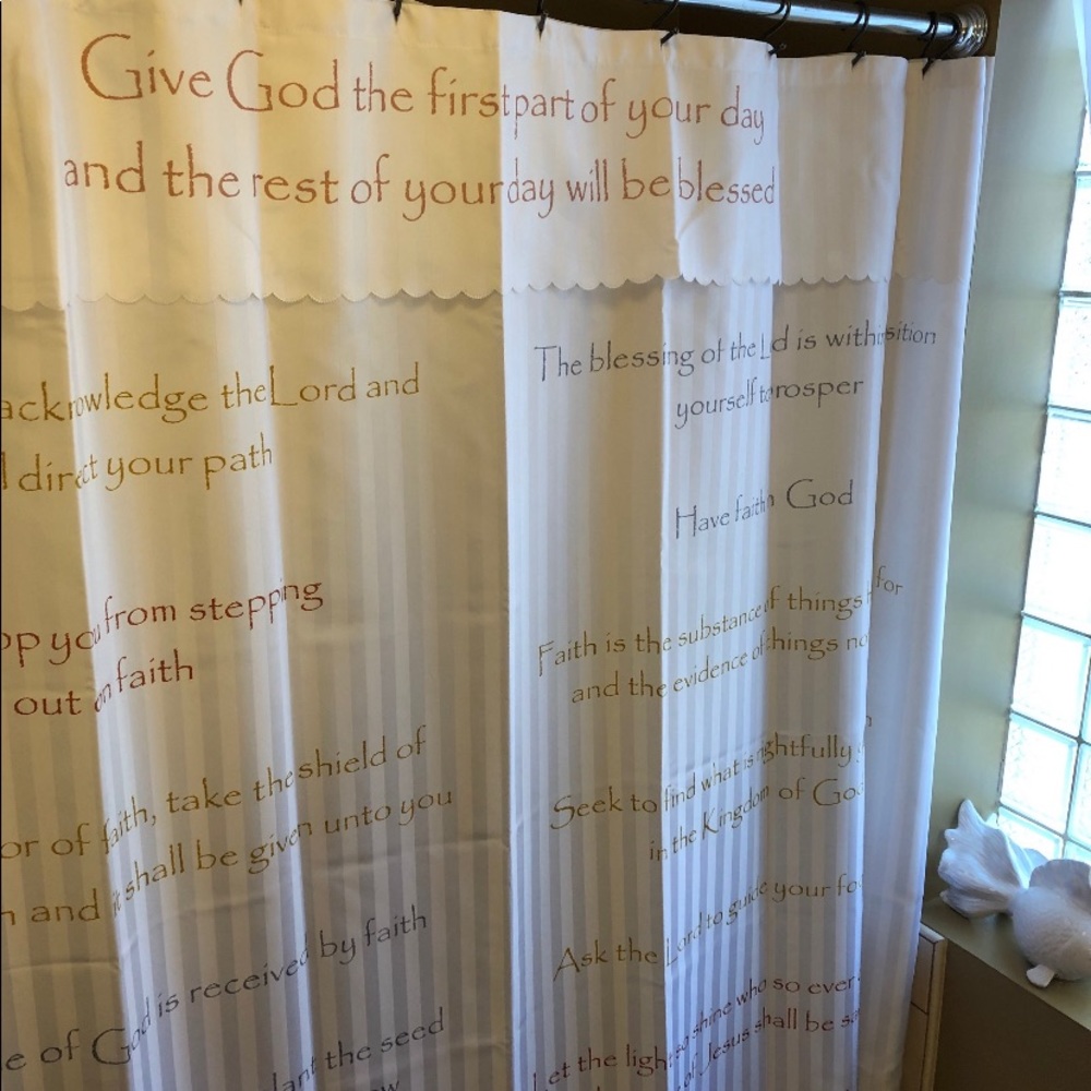 Curtains white with spiritual writings